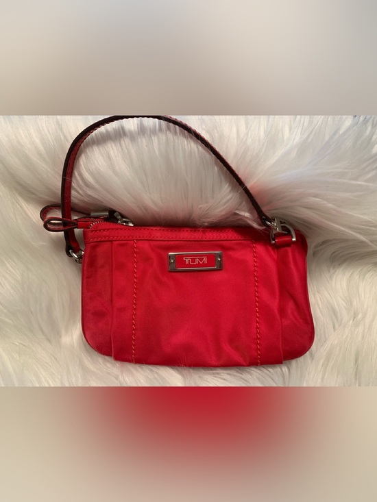 Tumi Handbags - TUMI Voyageur Vienna, raspberry color, triple compartment wristlet VGUC